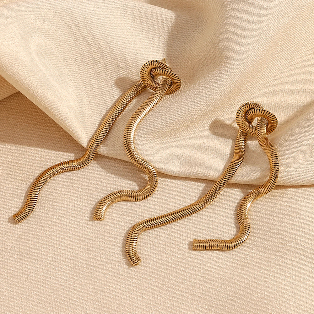 Pendientes "Eternal Knot" – Nudos de Oro Escultural