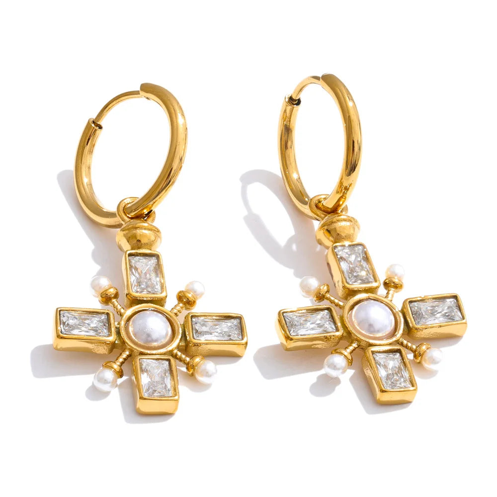Pendientes Sacred Pearl: Un Destello de Protección y Estilo