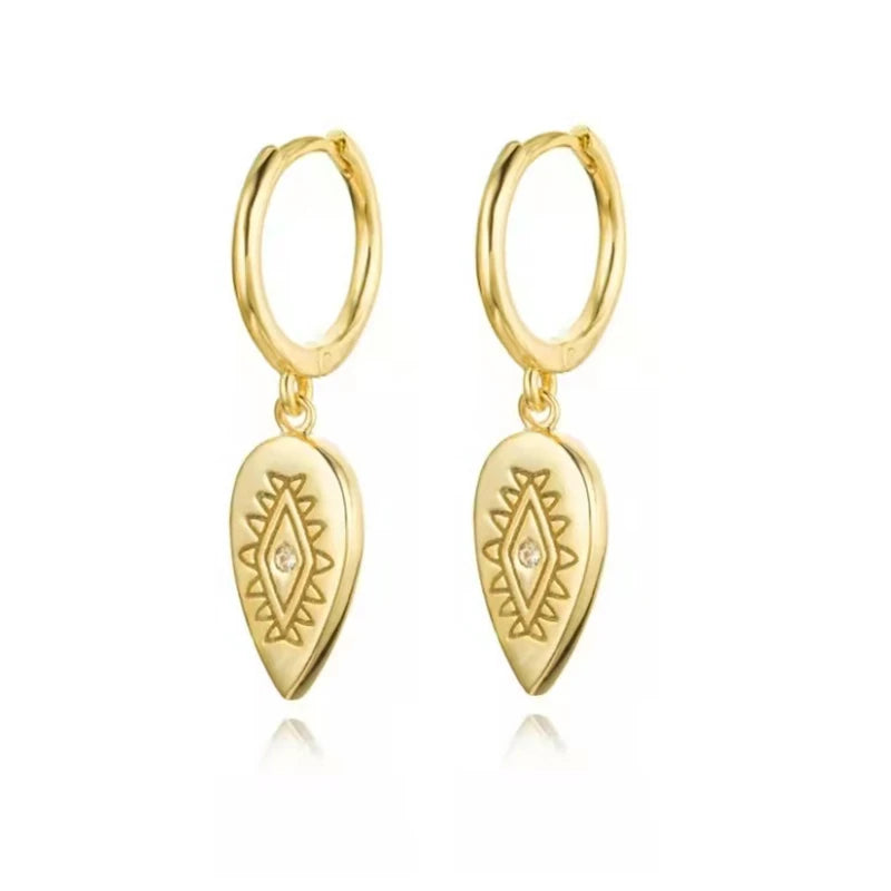 Pendientes Hamsa Protective: Tu Amuleto de Luz Diaria