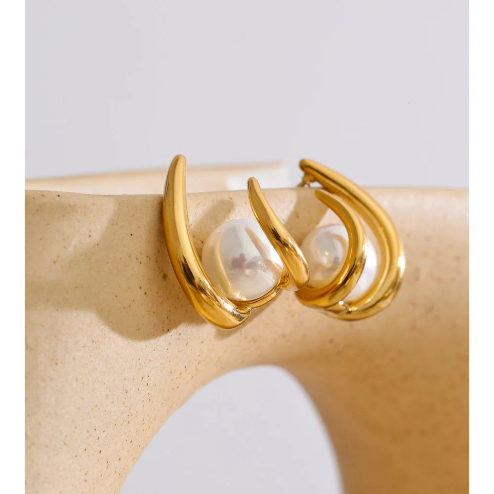 Pendientes Orbit Pearl: Vanguardia y Pureza