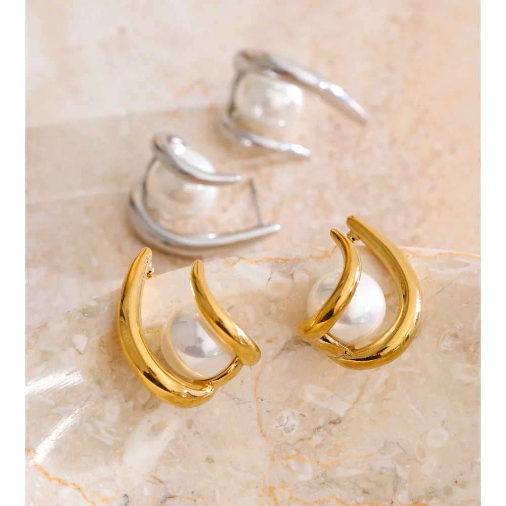 Pendientes Orbit Pearl: Vanguardia y Pureza