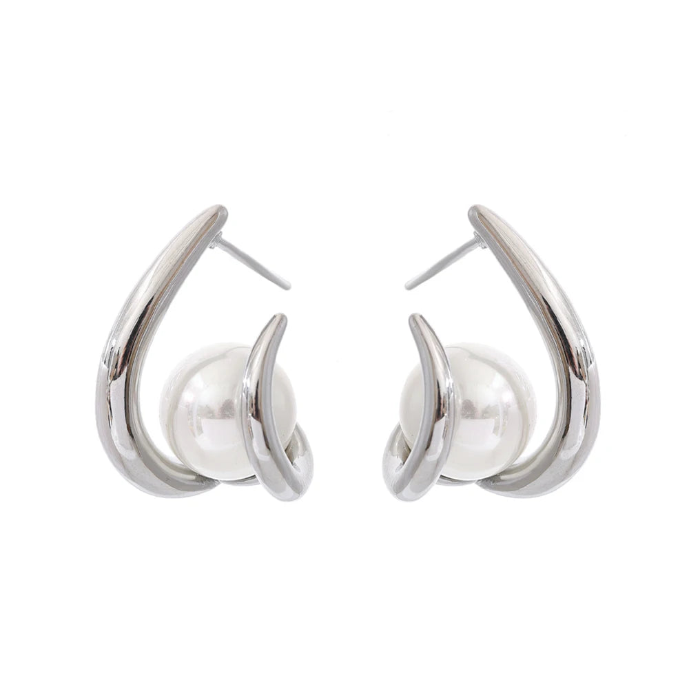 Pendientes Orbit Pearl: Vanguardia y Pureza