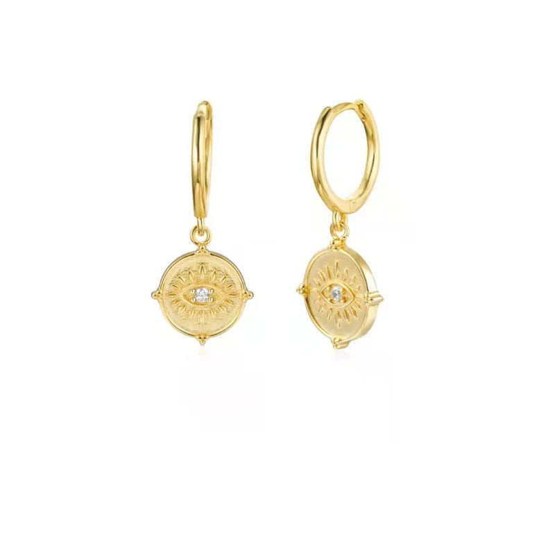 Pendientes Hamsa Protective: Tu Amuleto de Luz Diaria